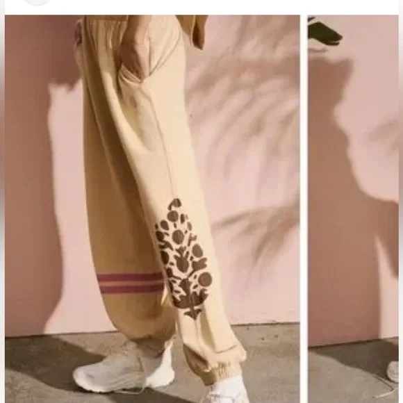 Free People Movement All Star Logo Pants in a cream color. - Picture 4 of 9